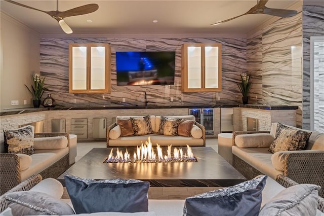 interior space with wine cooler, ceiling fan, and crown molding