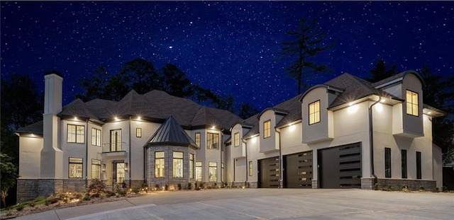 view of front of home with a garage