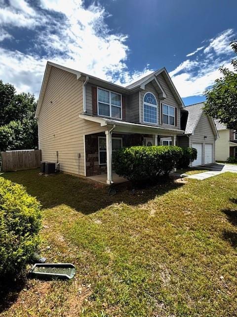 7178 Glaspie Way, Atlanta, GA 30349 - view of side of home featuring a garage and a central air condition unit