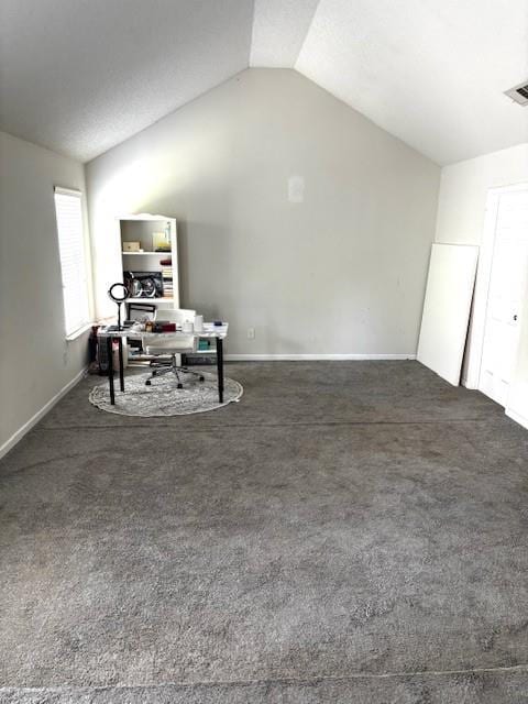 7178 Glaspie Way, Atlanta, GA 30349 - home office featuring lofted ceiling and carpet flooring