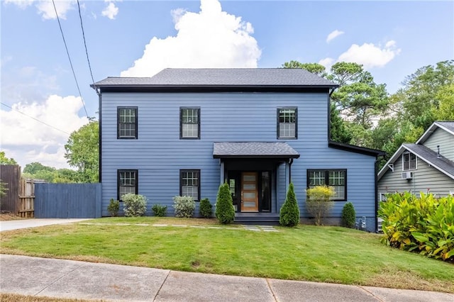 view of front of home with a front yard