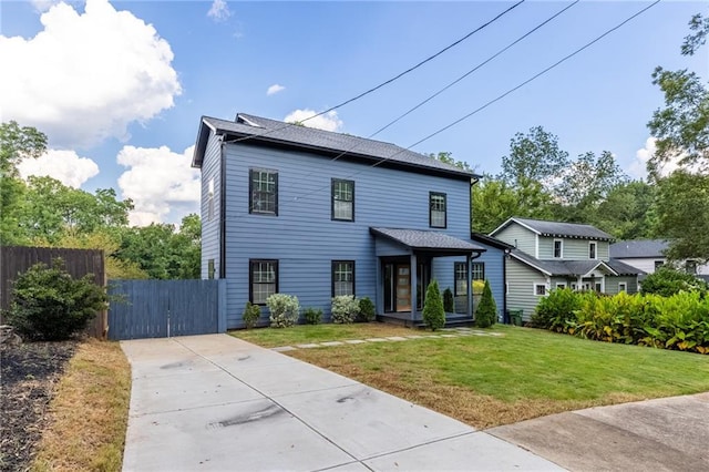 view of front of home featuring a front yard