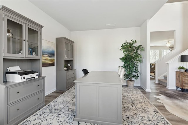 office featuring wood finished floors and baseboards