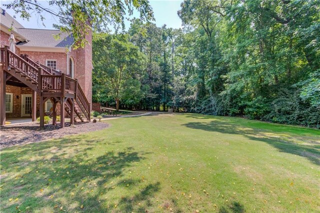1485 Rolling Links Dr, Alpharetta, GA 30004 - view of green lawn featuring stairway and a wooden deck
