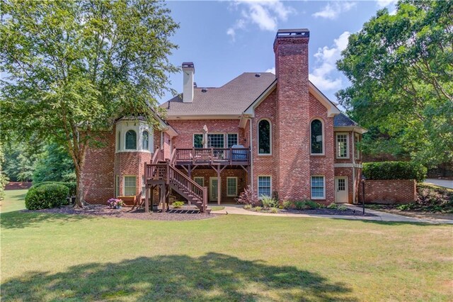 1485 Rolling Links Dr, Alpharetta, GA 30004 - view of green lawn featuring stairway and a wooden deck