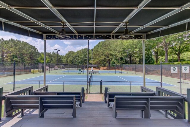 1485 Rolling Links Dr, Alpharetta, GA 30004 - view of tennis court with view of scattered trees