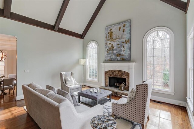 1485 Rolling Links Dr, Alpharetta, GA 30004 - living room featuring beam ceiling, baseboards, high vaulted ceiling, plenty of natural light, and wood finished floors