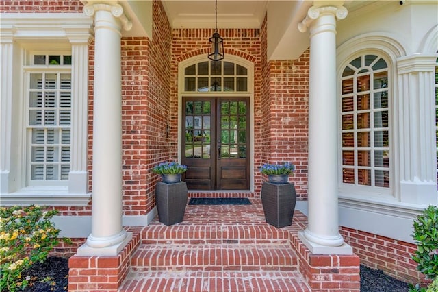 1485 Rolling Links Dr, Alpharetta, GA 30004 - doorway to property with brick siding, french doors, and a porch