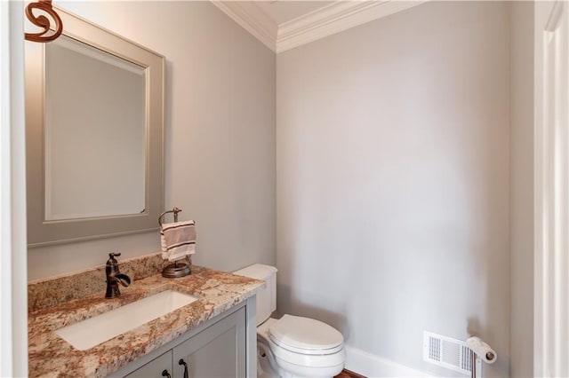 1485 Rolling Links Dr, Alpharetta, GA 30004 - bathroom with ornamental molding, vanity, toilet, and baseboards