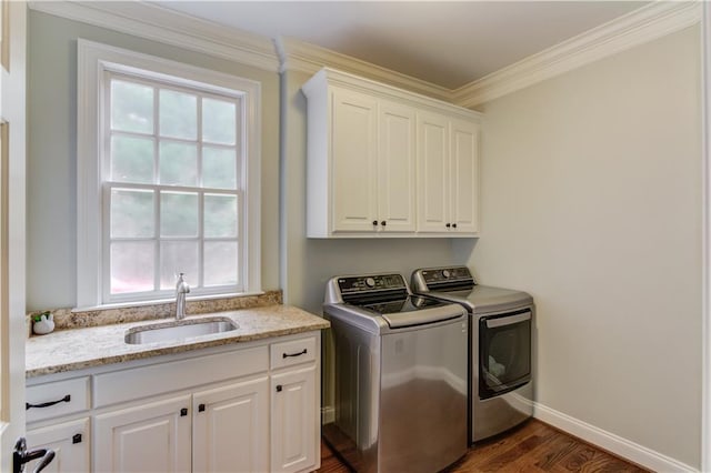 1485 Rolling Links Dr, Alpharetta, GA 30004 - laundry room with washing machine and dryer, cabinet space, dark wood-style flooring, crown molding, and baseboards
