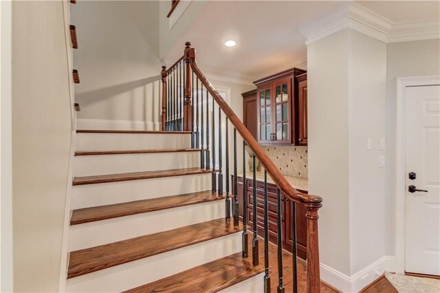 1485 Rolling Links Dr, Alpharetta, GA 30004 - stairs with crown molding, recessed lighting, baseboards, and wood finished floors