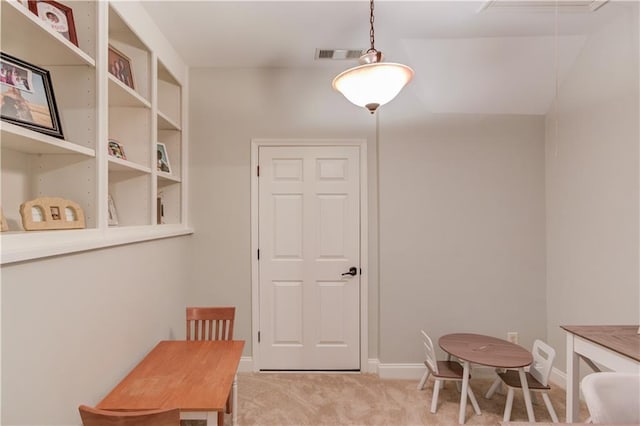 1485 Rolling Links Dr, Alpharetta, GA 30004 - dining space featuring light colored carpet, attic access, and baseboards