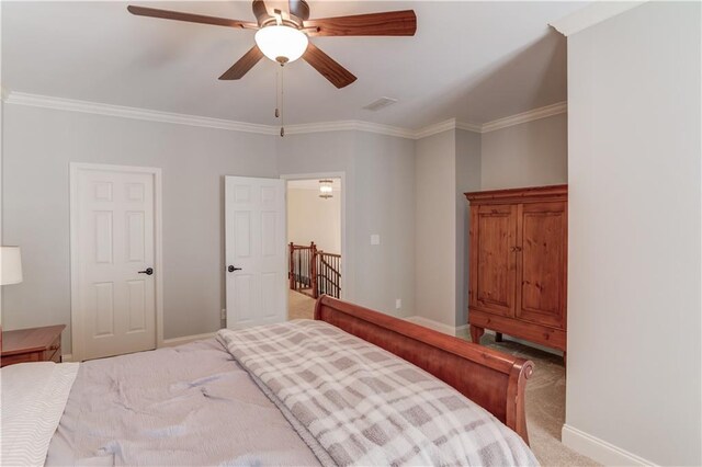 1485 Rolling Links Dr, Alpharetta, GA 30004 - bedroom with light colored carpet, baseboards, ornamental molding, and a ceiling fan