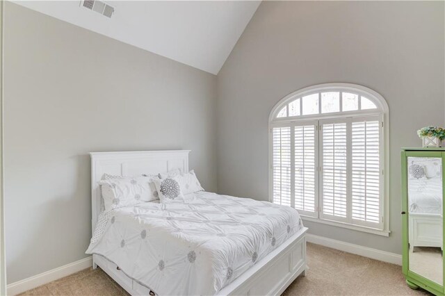 1485 Rolling Links Dr, Alpharetta, GA 30004 - bedroom with light carpet, lofted ceiling, and baseboards