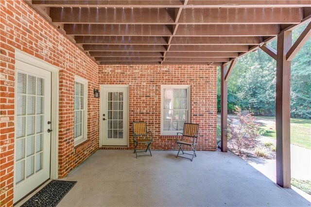 1485 Rolling Links Dr, Alpharetta, GA 30004 - view of patio with stairs and a forest view