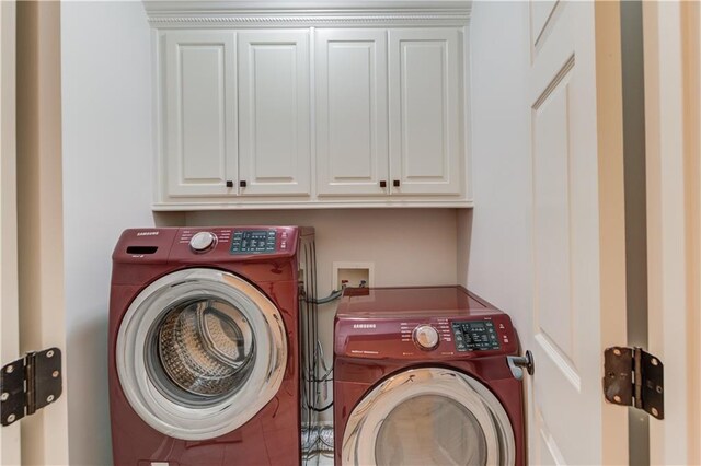 1485 Rolling Links Dr, Alpharetta, GA 30004 - washroom featuring washer and dryer and cabinet space