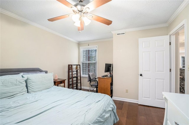 bedroom featuring ornamental molding, dark wood-type flooring, a textured ceiling, and ceiling fan