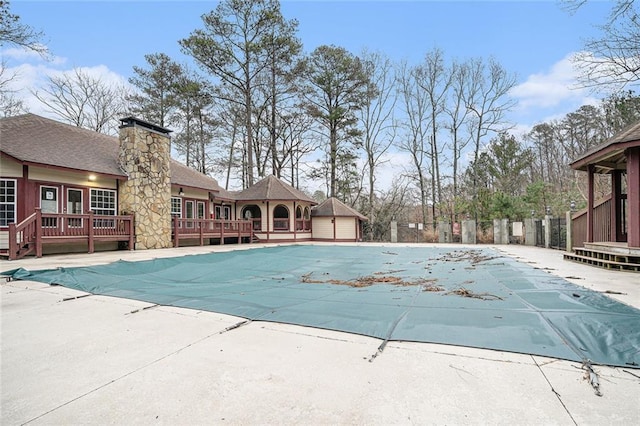 view of pool featuring a wooden deck