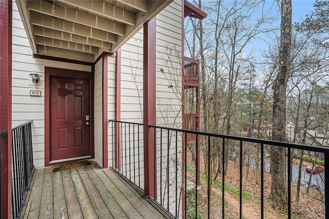 entrance to property featuring a balcony