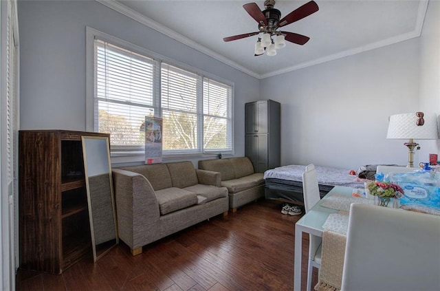 bedroom featuring dark wood-style floors, ceiling fan, and crown molding