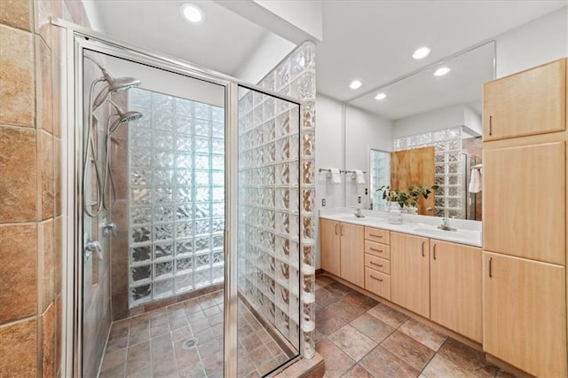 1344 Fernwood Cir NE, Brookhaven, GA 30319 - bathroom with a shower stall, double vanity, recessed lighting, and stone finish flooring