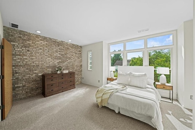 1344 Fernwood Cir NE, Brookhaven, GA 30319 - bedroom with brick wall, carpet floors, and recessed lighting