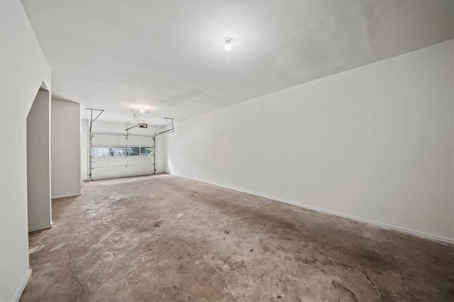 1344 Fernwood Cir NE, Brookhaven, GA 30319 - garage featuring a garage door opener