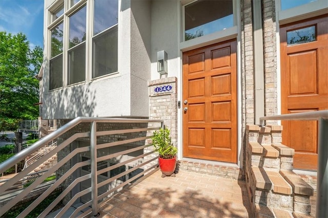 1344 Fernwood Cir NE, Brookhaven, GA 30319 - doorway to property featuring stucco siding