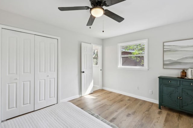 2519 Miriam Ln, Decatur, GA 30032 - unfurnished bedroom with a closet, baseboards, ceiling fan, and wood finished floors