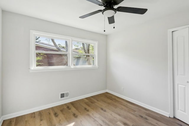 2519 Miriam Ln, Decatur, GA 30032 - unfurnished room with baseboards, visible vents, a healthy amount of sunlight, and wood finished floors