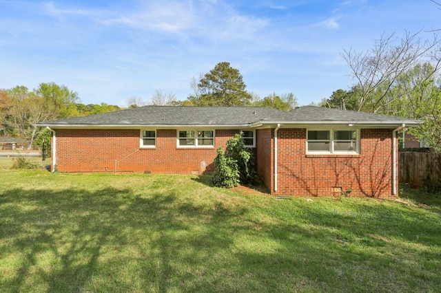 2519 Miriam Ln, Decatur, GA 30032 - back of house with a lawn, brick siding, fence, and crawl space