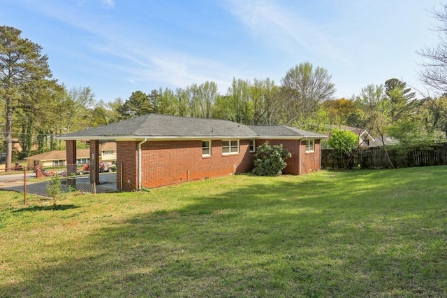 2519 Miriam Ln, Decatur, GA 30032 - exterior space with a lawn, fence, and brick siding