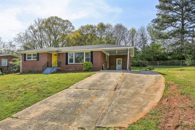 2519 Miriam Ln, Decatur, GA 30032 - single story home with fence, concrete driveway, brick siding, a front lawn, and a carport