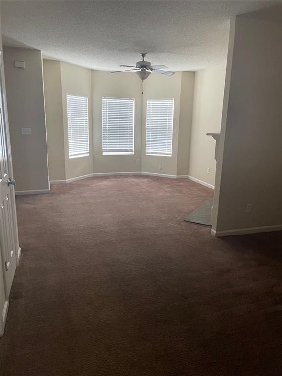 8170 Oakley Cir, Union City, GA 30291 - empty room featuring a ceiling fan, carpet flooring, and a textured ceiling