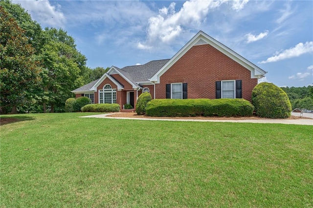 view of front of house with a front lawn