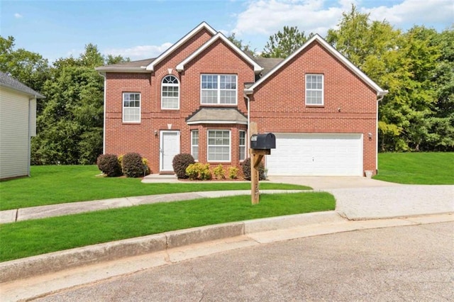 1127 Oak Hollow Ct, Hampton, GA 30228 - view of front of home featuring a garage, driveway, brick siding, and a front lawn