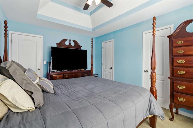 1127 Oak Hollow Ct, Hampton, GA 30228 - bedroom with carpet floors, a tray ceiling, and ceiling fan