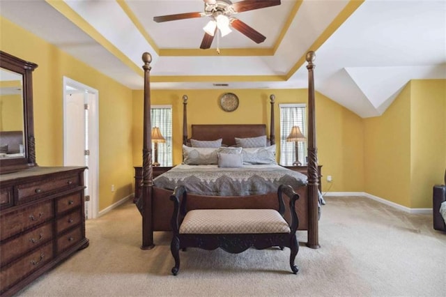 1127 Oak Hollow Ct, Hampton, GA 30228 - bedroom featuring light colored carpet, a raised ceiling, and baseboards