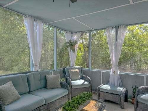 1127 Oak Hollow Ct, Hampton, GA 30228 - sunroom with an outdoor hangout area and healthy amount of natural light
