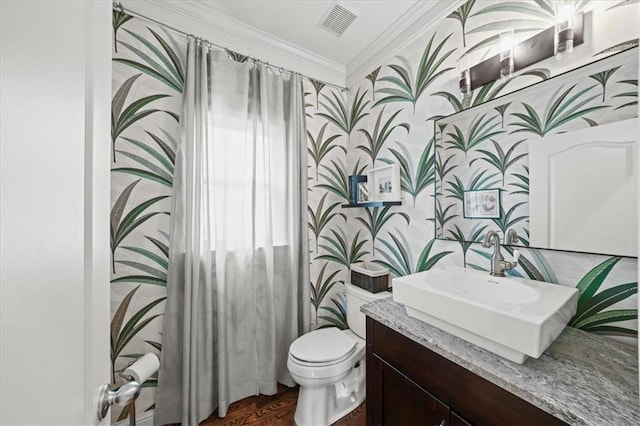 1622 Gates Pl NW, Atlanta, GA 30318 - bathroom featuring wallpapered walls, vanity, crown molding, and wood finished floors