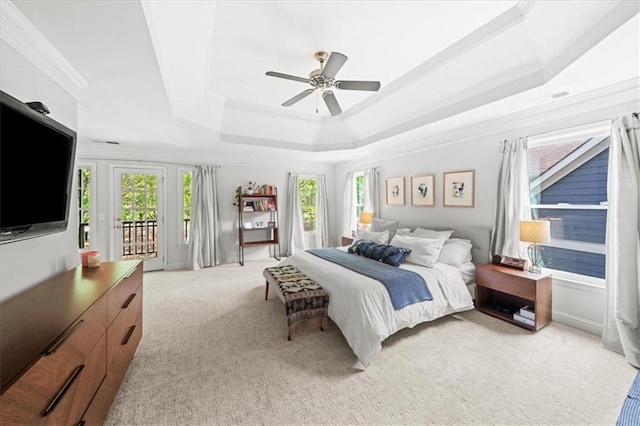 1622 Gates Pl NW, Atlanta, GA 30318 - bedroom featuring a raised ceiling, crown molding, access to outside, multiple windows, and light carpet