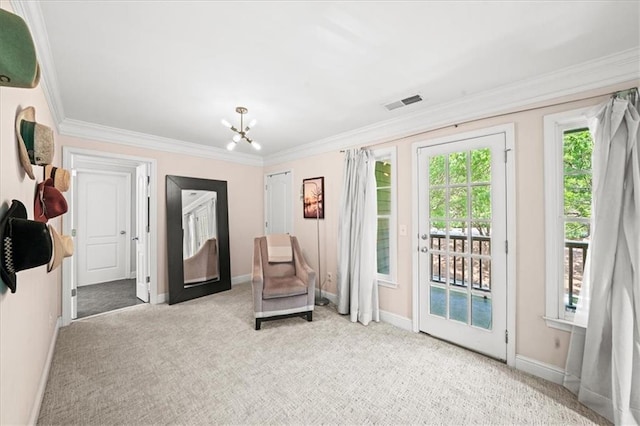 1622 Gates Pl NW, Atlanta, GA 30318 - sitting room featuring carpet flooring, ornamental molding, and a chandelier