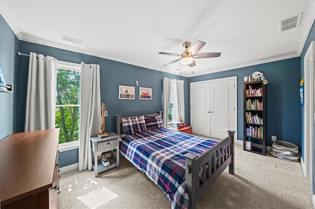 1622 Gates Pl NW, Atlanta, GA 30318 - bedroom featuring carpet flooring, a closet, crown molding, and ceiling fan