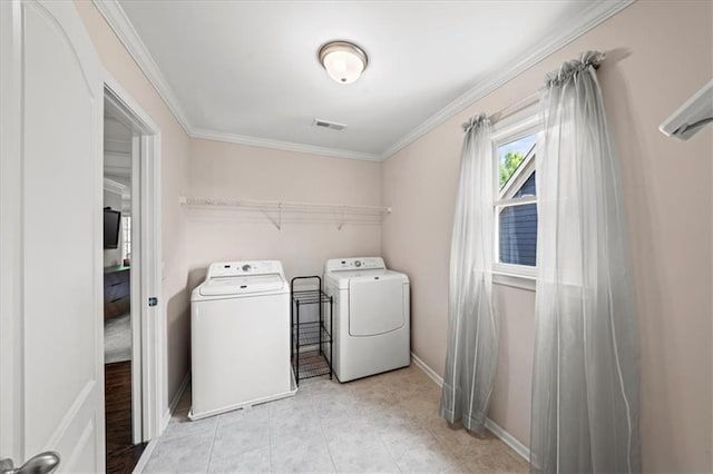 1622 Gates Pl NW, Atlanta, GA 30318 - laundry area featuring separate washer and dryer, ornamental molding, and light tile patterned floors