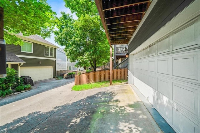 1622 Gates Pl NW, Atlanta, GA 30318 - view of property exterior featuring a garage and driveway