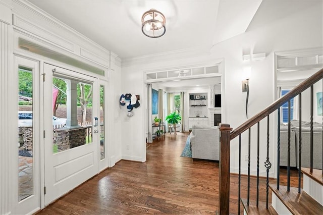 1622 Gates Pl NW, Atlanta, GA 30318 - entryway with stairway, dark wood finished floors, and ornamental molding