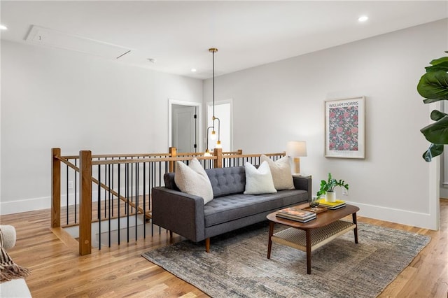 living room with light hardwood / wood-style floors