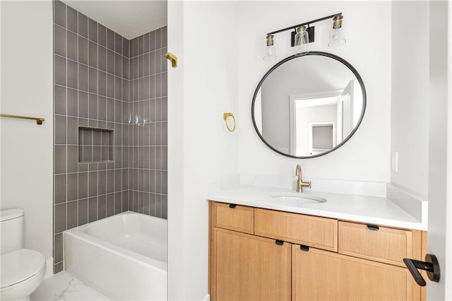 full bathroom with toilet, tiled shower / bath combo, and vanity