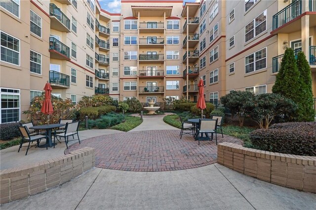 view of home's community with a patio