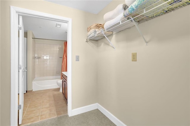 interior space featuring light tile patterned flooring